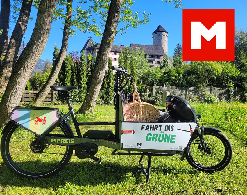 Lastenfahrrad. Logo MPreis